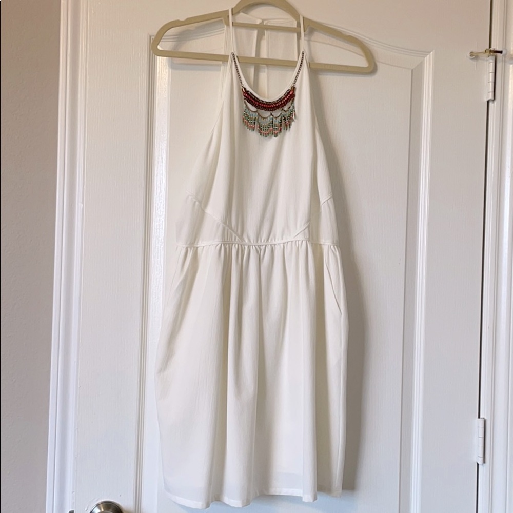 White dress with beaded collar